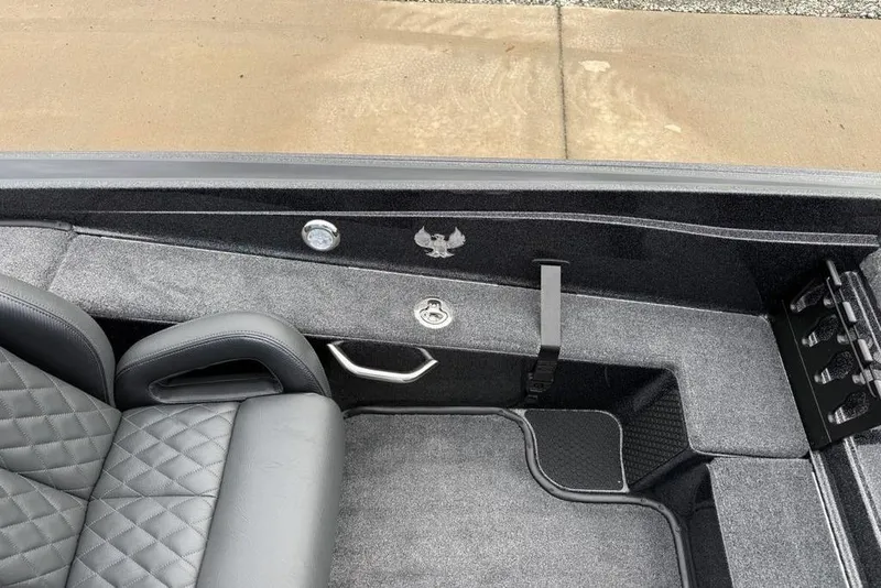 Slide: The Image of 2026 Phoenix 721 ZXL boat interior with quilted seats and sleek design. - 16