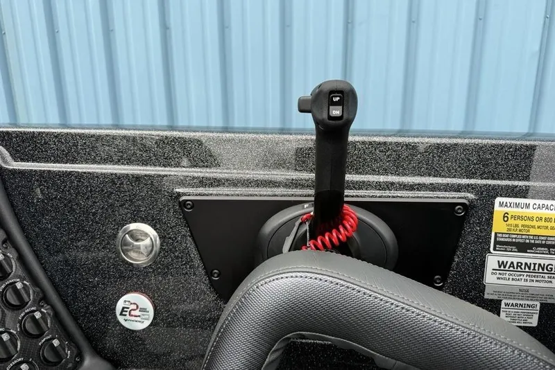 Slide: The Image of Control panel of 2026 Phoenix 721 ZXL boat with steering and capacity warning. - 20