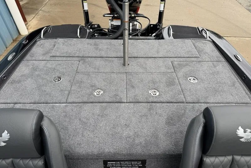 Slide: The Image of 2026 Phoenix 721 ZXL boat deck with gray carpet and storage compartments. - 22