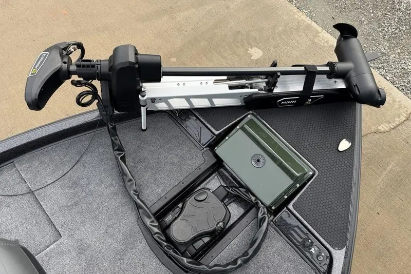 Slide: The Image of Phoenix 721 ZXL 2026 boat with Minn Kota trolling motor and control panel on deck. - 6