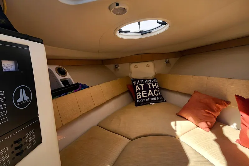 Slide: The Image of Cozy interior of 2014 Wellcraft 35 Scarab Sport boat with cushions and JL Audio system. - 20