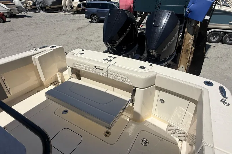 Slide: The Image of 2026 Scout 288 LXF boat with dual Mercury engines, featuring a spacious deck and seating area. - 17
