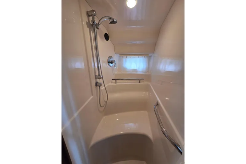 Slide: The Image of Shower area in 2007 Sea Ray 40 Sundancer yacht, featuring modern fixtures and sleek design. - 13