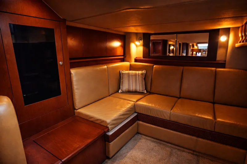 Slide: The Image of Luxurious interior of 2007 Sea Ray 40 Sundancer yacht with leather seating and warm lighting. - 7