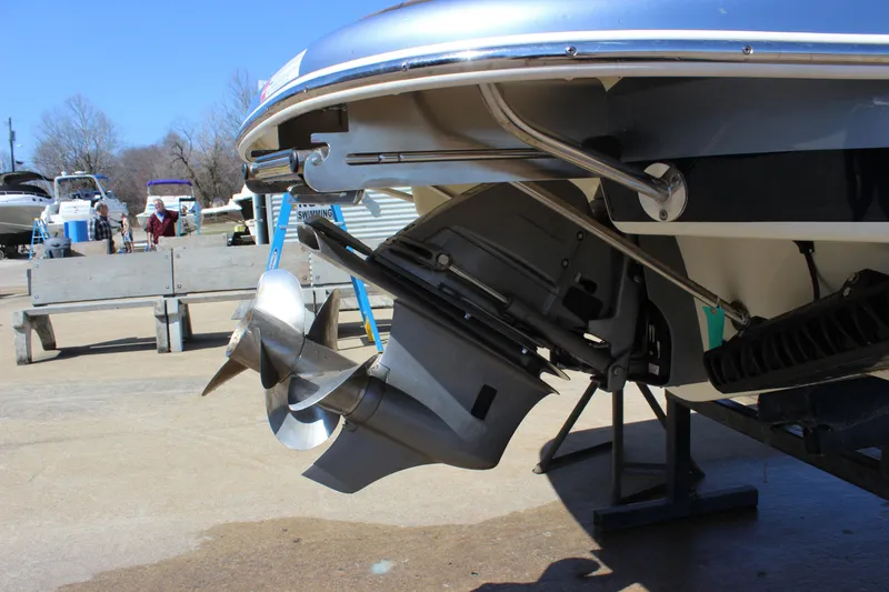 Slide: The Image of 2024 Chris-Craft Launch 27 boat propeller and stern detail in a marina setting. - 5