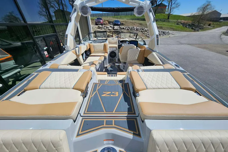 Slide: The Image of 2026 Tigé Z3 boat with luxurious seating and modern design. - 10