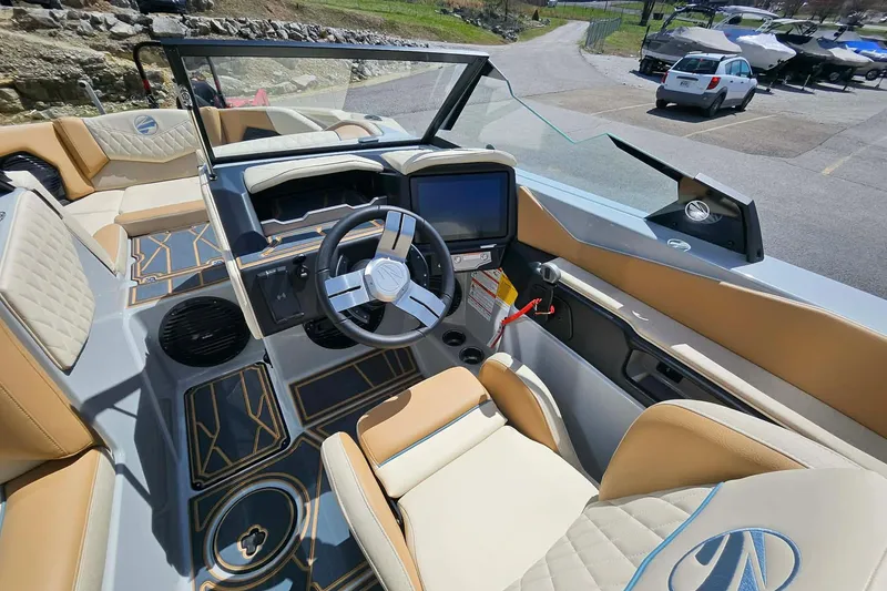 Slide: The Image of 2026 Tigé Z3 boat interior with modern dashboard and luxurious seating. - 11