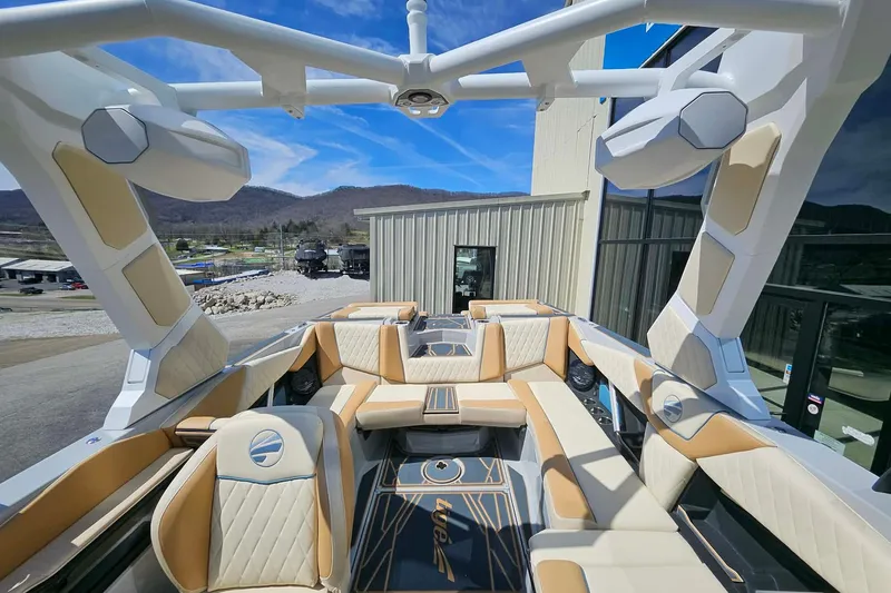 Slide: The Image of Luxurious interior of 2026 Tigé Z3 boat with beige seating and modern design. - 13