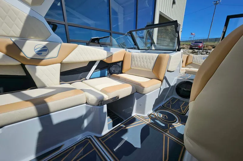 Slide: The Image of 2026 Tigé Z3 boat interior with luxurious beige seating and modern design. - 15