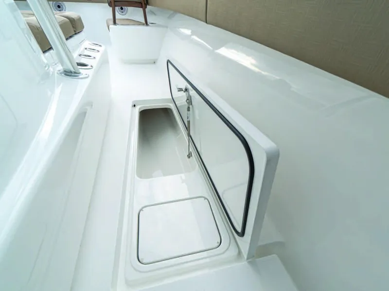 Slide: The Image of 2026 Valhalla Boatworks V-41 interior storage compartment, open and spacious design. - 29