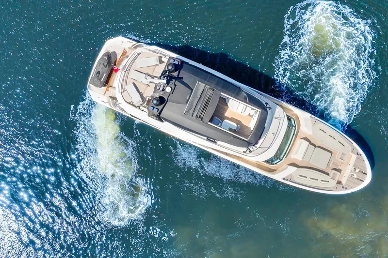 Slide: The Image of Aerial view of 2015 Monte Carlo Yachts MCY 86 cruising on open water. - 1