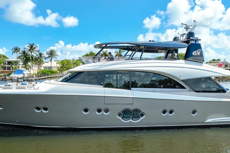 Slide: The Image of 2015 Monte Carlo Yachts MCY 86 luxury yacht cruising on a sunny day. - 14