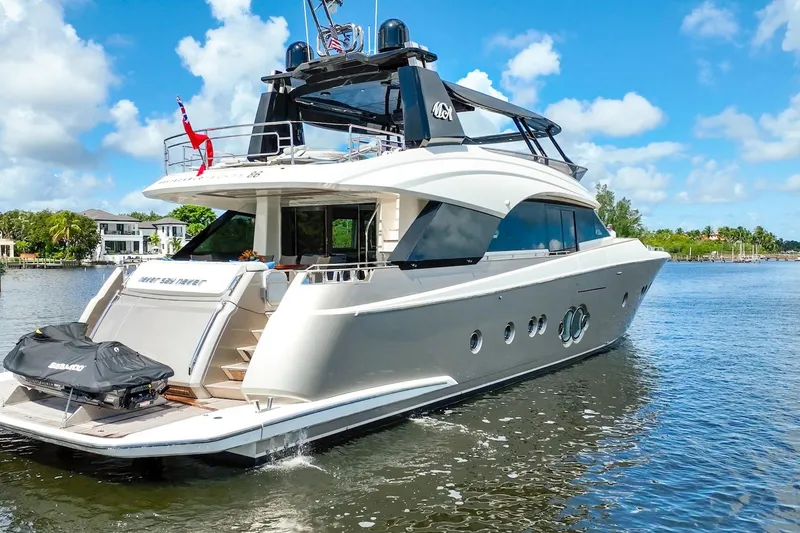 Slide: The Image of Luxury 2015 Monte Carlo Yachts MCY 86 cruising on a sunny day. - 17