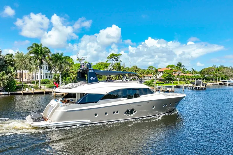 Slide: The Image of Luxurious 2015 Monte Carlo Yachts MCY 86 cruising on a scenic waterway. - 19