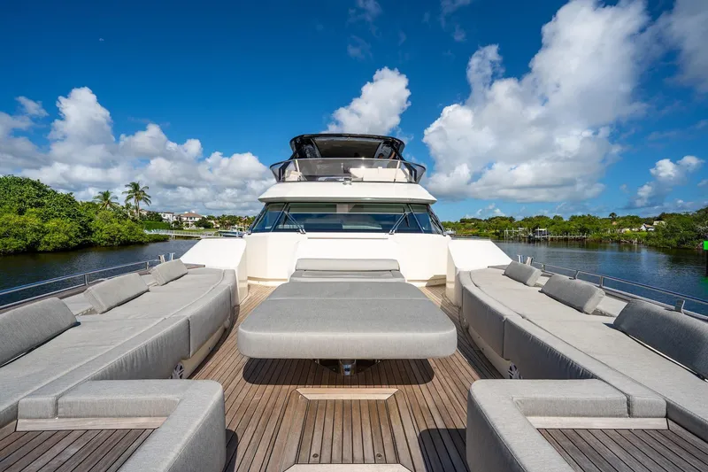 Slide: The Image of Luxurious 2015 Monte Carlo Yachts MCY 86 with spacious deck and elegant seating. - 24