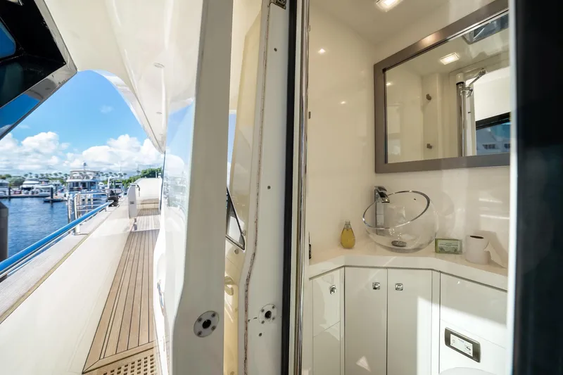 Slide: The Image of Luxurious 2015 Monte Carlo Yachts MCY 86 bathroom and deck view. - 32