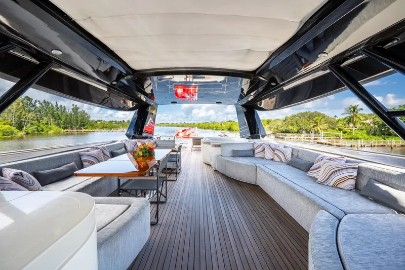 Slide: The Image of Luxurious 2015 Monte Carlo Yachts MCY 86 interior with elegant seating and scenic water views. - 37