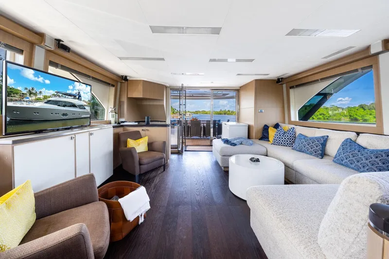 Slide: The Image of Luxurious interior of 2015 Monte Carlo Yachts MCY 86 with elegant seating and large windows. - 46