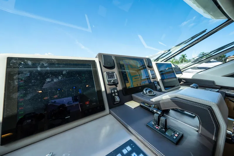 Slide: The Image of Cockpit of 2015 Monte Carlo Yachts MCY 86 with advanced navigation displays. - 47