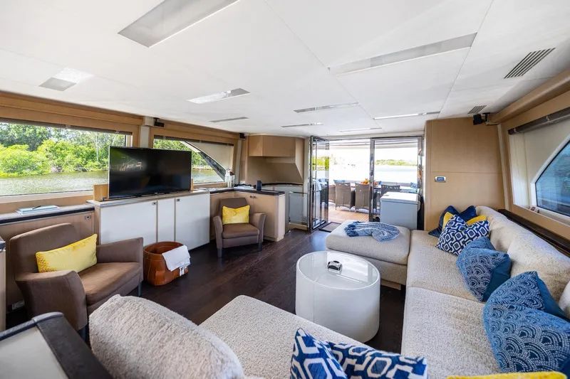 Slide: The Image of Luxurious interior of 2015 Monte Carlo Yachts MCY 86 with elegant seating and large windows. - 54