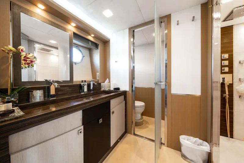 Slide: The Image of Luxurious bathroom on 2015 Monte Carlo Yachts MCY 86, featuring modern fixtures and elegant design. - 61