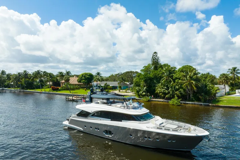 Slide: The Image of Luxurious 2015 Monte Carlo Yachts MCY 86 cruising on a scenic waterway. - 7