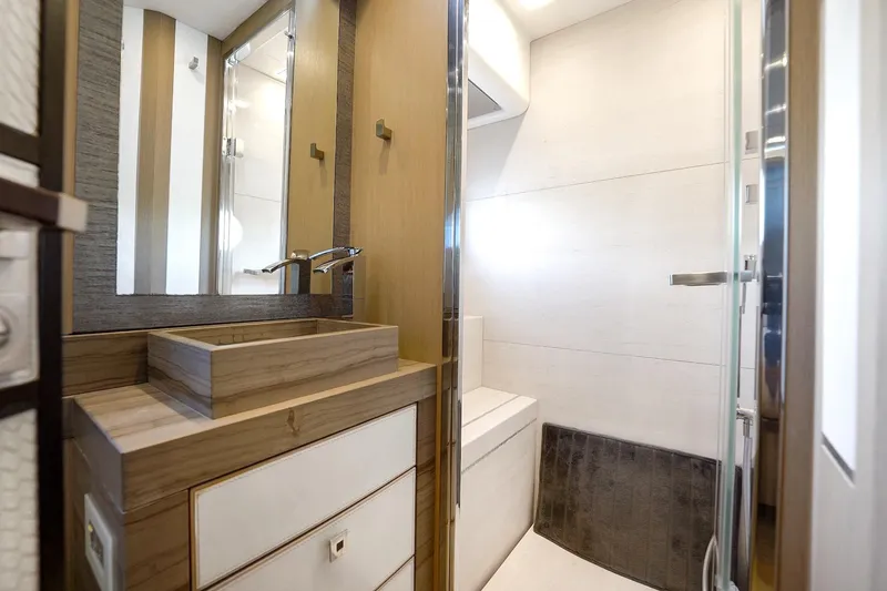 Slide: The Image of Luxurious bathroom interior of 2015 Monte Carlo Yachts MCY 86, featuring modern sink and elegant design. - 71