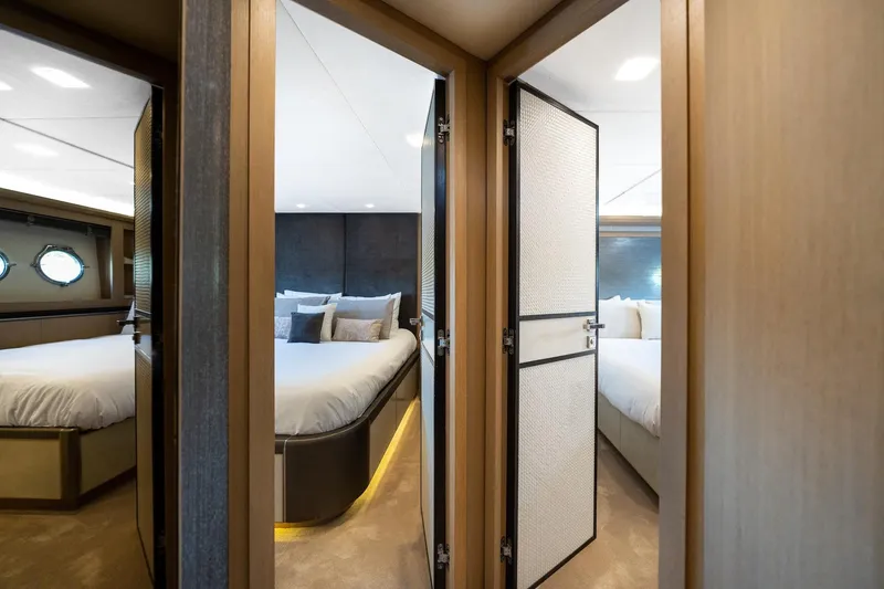 Slide: The Image of Luxurious interior of 2015 Monte Carlo Yachts MCY 86, featuring elegant bedrooms. - 73