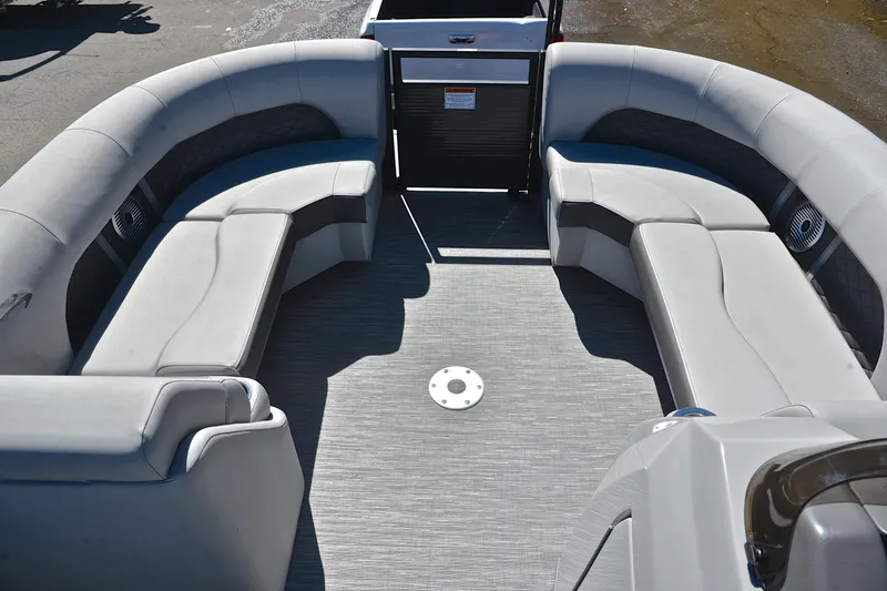 Slide: The Image of 2022 Bennington 22 L pontoon boat interior with spacious seating and modern design. - 21