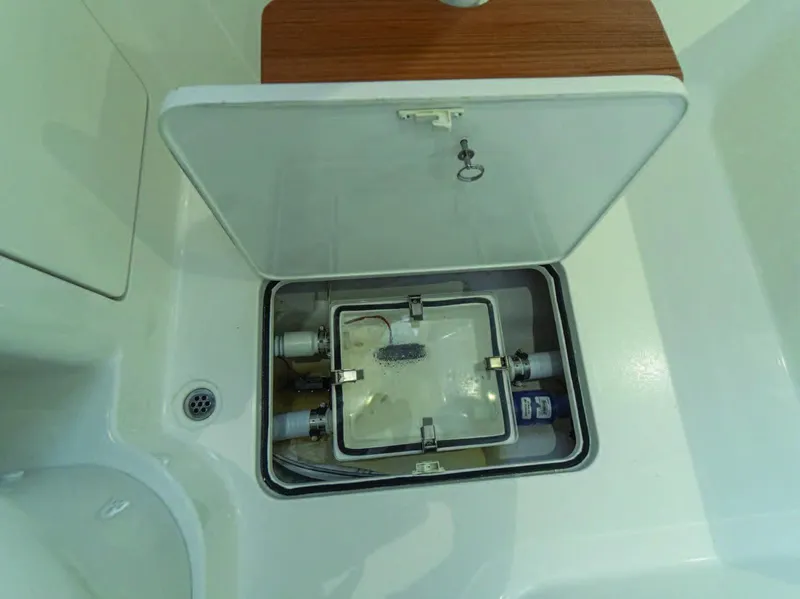 Slide: The Image of 2026 Valhalla Boatworks V-37 hatch with plumbing components and storage space. - 30