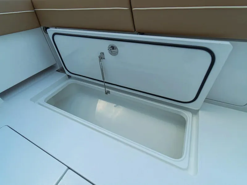 Slide: The Image of Open storage compartment on 2026 Valhalla Boatworks V-37 boat. - 4