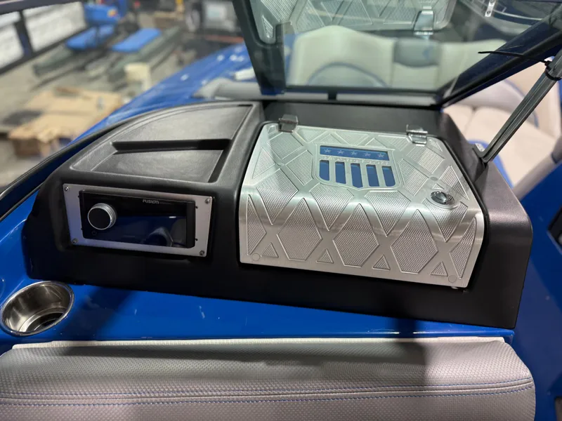 Slide: The Image of Dashboard of a 2016 MasterCraft X20 boat with Fusion stereo system. - 25
