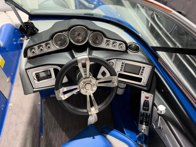Slide: The Image of Dashboard of a 2016 MasterCraft X20 boat with modern gauges. - 29
