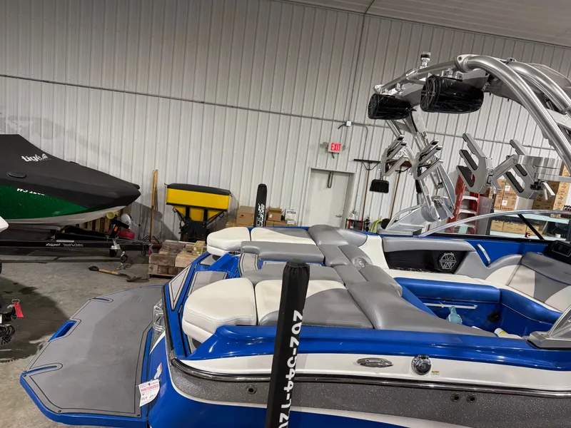 Slide: The Image of 2016 MasterCraft X20 boat in warehouse with accessories. - 5