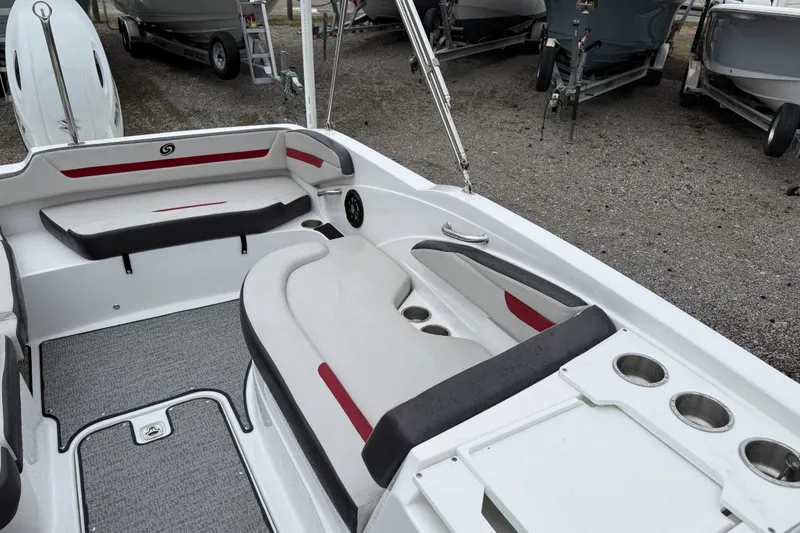 Slide: The Image of Interior view of 2022 Hurricane SunDeck Sport 205 OB boat with seating and cup holders. - 26