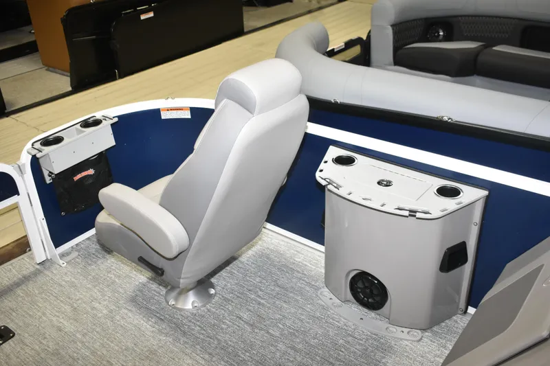Slide: The Image of 2026 Premier 230 Sunsation Angler 4PT boat interior with seating and cup holders. - 10