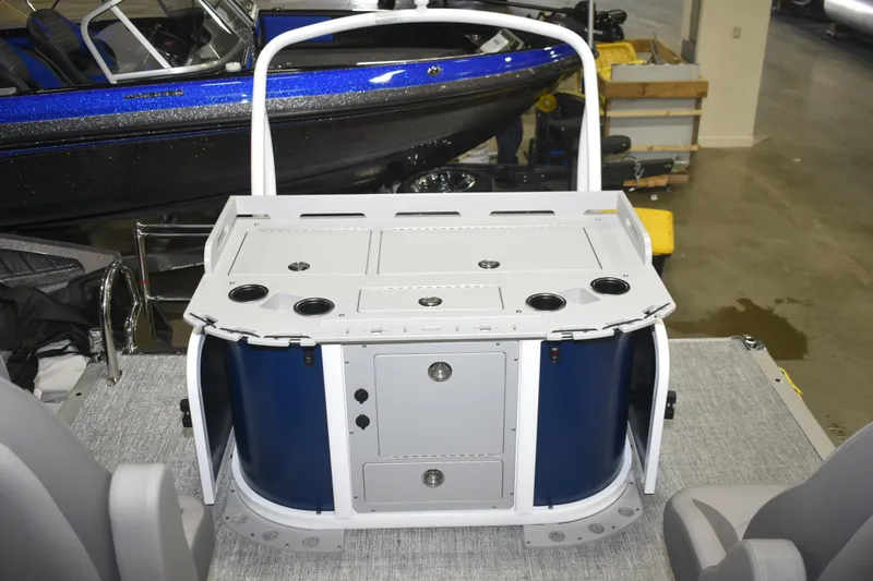 Slide: The Image of 2026 Premier 230 Sunsation Angler 4PT PTX boat interior with fishing station and storage compartments. - 19