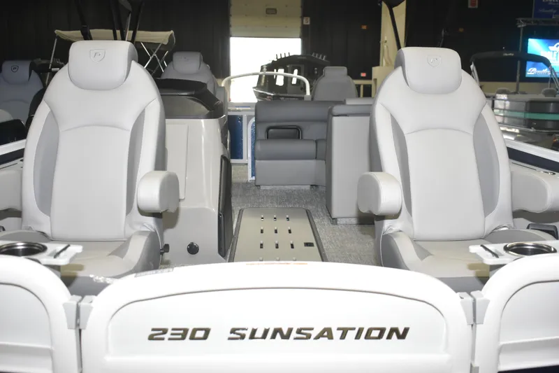 Slide: The Image of 2026 Premier 230 Sunsation Angler 4PT boat interior with plush seating and modern design. - 4