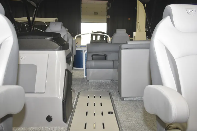 Slide: The Image of Interior of 2026 Premier 230 Sunsation Angler 4PT boat, featuring modern seating and design. - 8