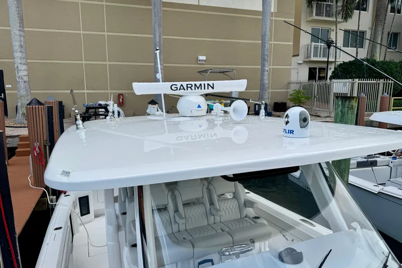 Slide: The Image of 2024 Intrepid 427 Nomad SE boat with Garmin and FLIR equipment on the roof. - 25