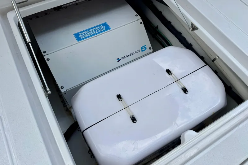 Slide: The Image of Seakeeper 5 stabilizer unit in 2024 Intrepid 427 Nomad SE boat compartment. - 26