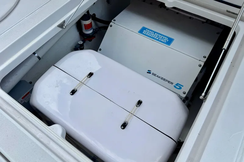 Slide: The Image of 2024 Intrepid 427 Nomad SE Seakeeper 5 stabilizer system in boat compartment. - 27
