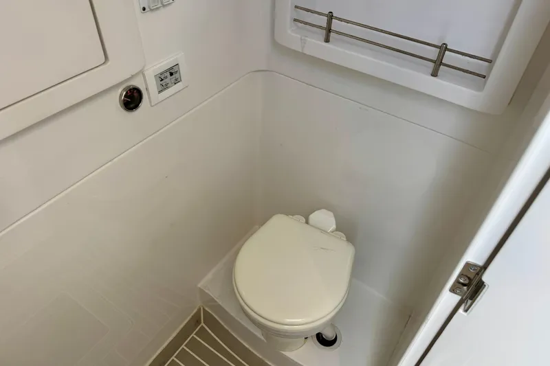 Slide: The Image of Compact marine bathroom in 2024 Intrepid 427 Nomad SE boat. - 28