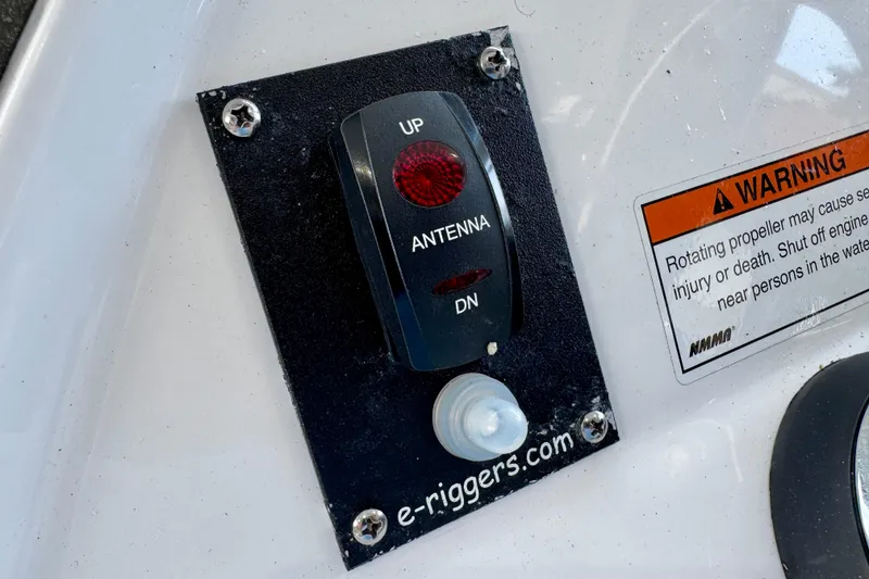 Slide: The Image of 2024 Intrepid 427 Nomad SE antenna control panel with warning label. - 30
