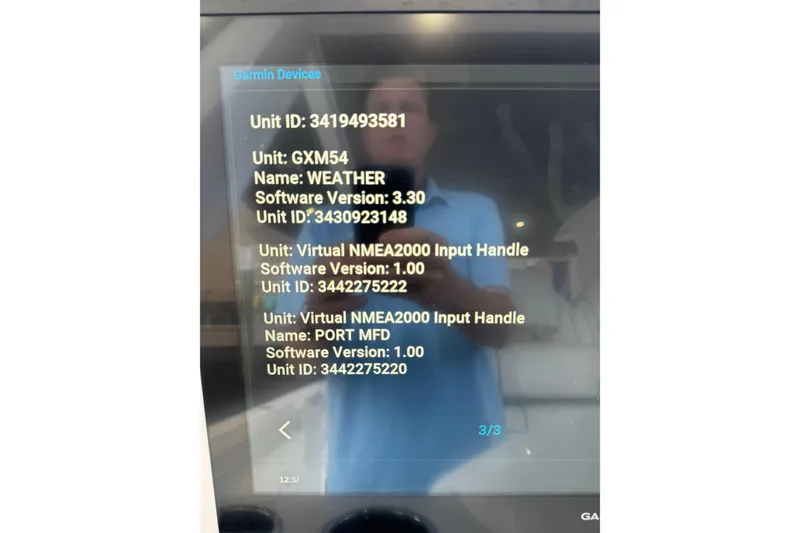 Slide: The Image of Garmin device display on 2024 Intrepid 427 Nomad SE showing unit IDs and software versions. - 32