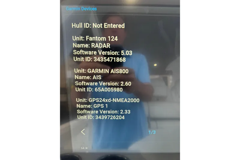 Slide: The Image of Display screen showing Garmin device information on a 2024 Intrepid 427 Nomad SE. - 36