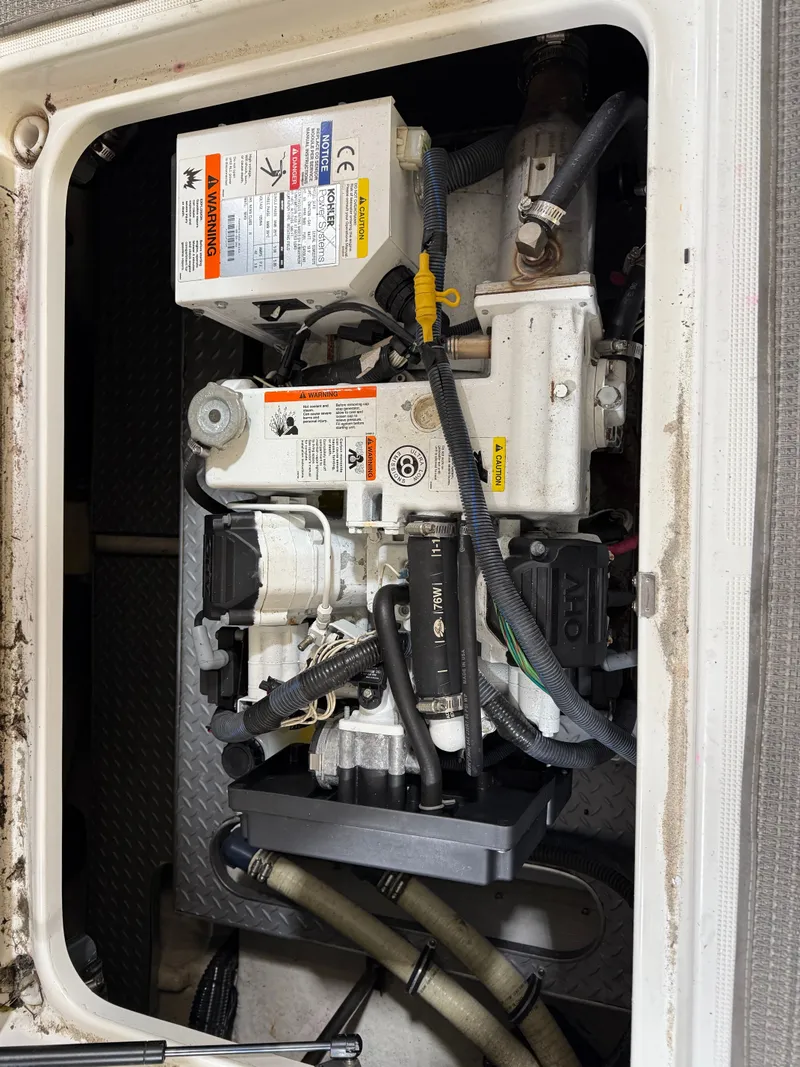 Slide: The Image of Engine compartment of a 2016 Formula 350 CBR boat. - 16