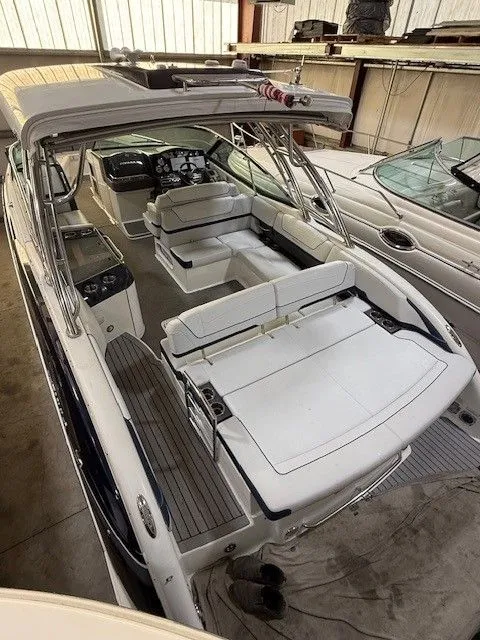 Slide: The Image of 2016 Formula 350 FX Crossover Bowrider parked indoors. - 15