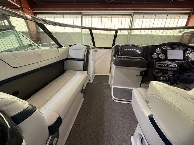Slide: The Image of Interior of a 2016 Formula 350 FX Crossover Bowrider boat. - 22