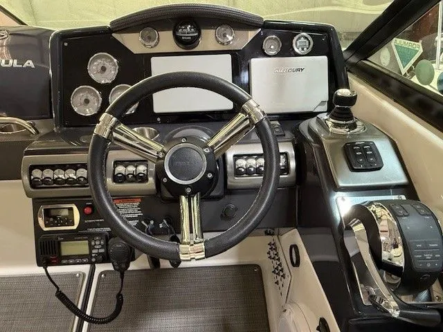 Slide: The Image of Dashboard of a 2016 Formula 350 FX Crossover Bowrider boat. - 25